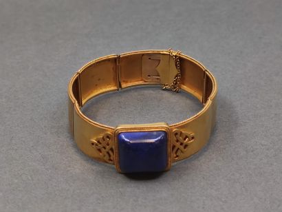 
Bracelet jonc articulé en or jaune 750 orné...
