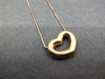 COLLIER en or jaune 750° accompagnée d'un...