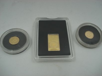 2 Médailles 14kt 0,59 g 1 Petit lingotin...