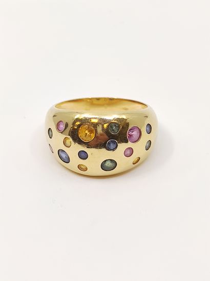 BAGUE jonc en or 750°, pavée d'un tutti frutti...