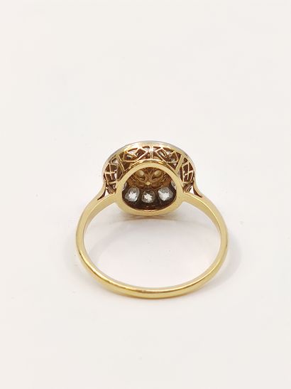 BAGUE circulaire en or 750°, ornée de douze...