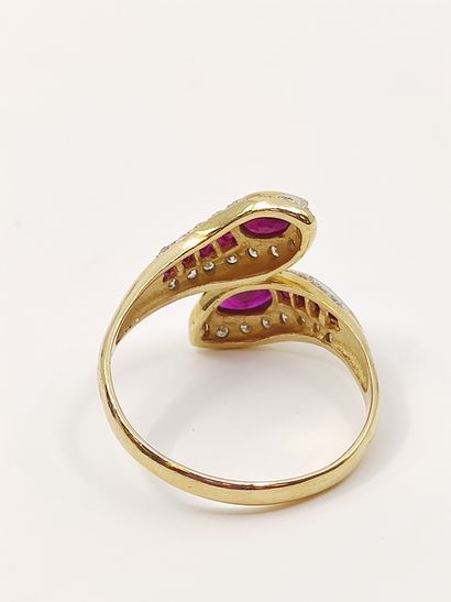 BAGUE toi et moi serpent en or 750°, ornée...