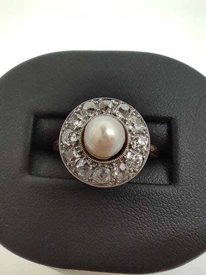 BAGUE circulaire en or 750°, ornée de douze...