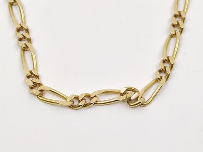 BRACELET maille gourmette en or jaune 750°...