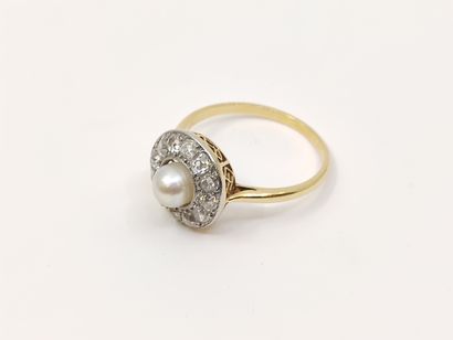 BAGUE circulaire en or 750°, ornée de douze...
