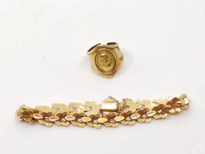 
LOT d'or 750° comprenant :

Bracelet articulé 

Bague...