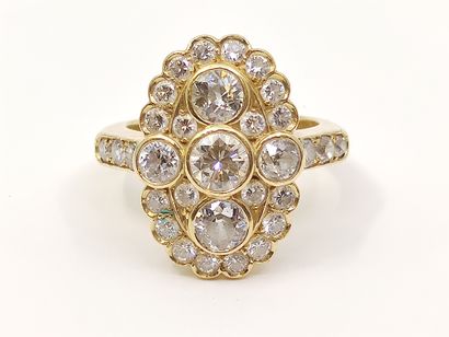 BAGUE en or jaune 750°, ornée d'un diamant...