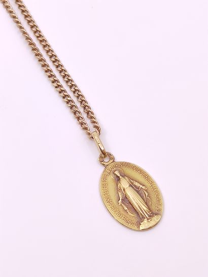 CHAINE avec sa médaille en or jaune 750

Poids...