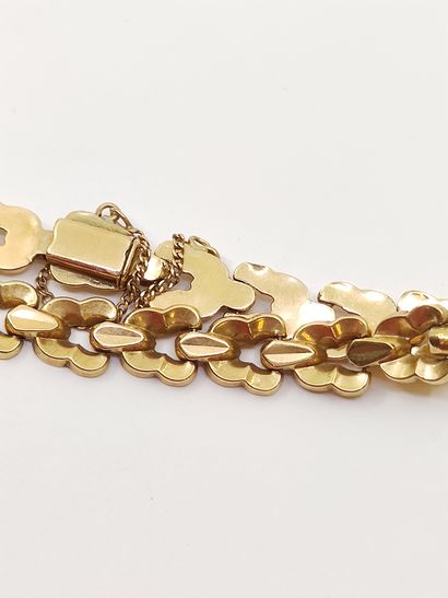 
LOT d'or 750° comprenant :

Bracelet articulé 

Bague...