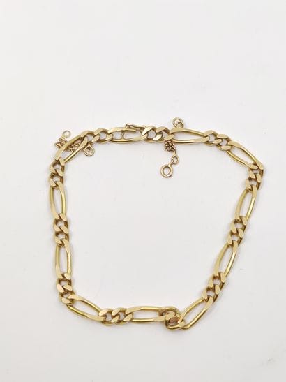 BRACELET maille gourmette en or jaune 750°...