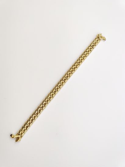 BRACELET en or jaune 750°, orné de rubis...