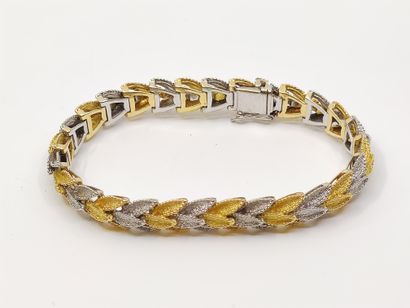 BRACELET en or jaune et blanc 750 amati à...