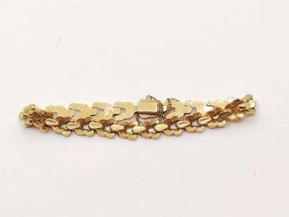 
LOT d'or 750° comprenant :

Bracelet articulé 

Bague...