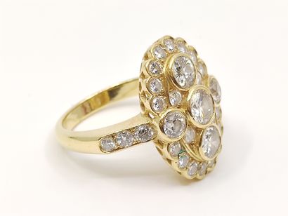 BAGUE en or jaune 750°, ornée d'un diamant...
