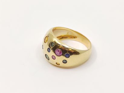 BAGUE jonc en or 750°, pavée d'un tutti frutti...