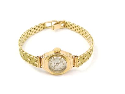DISKO

Montre bracelet de dame en or jaune...