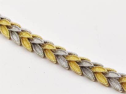 BRACELET en or jaune et blanc 750 amati à...