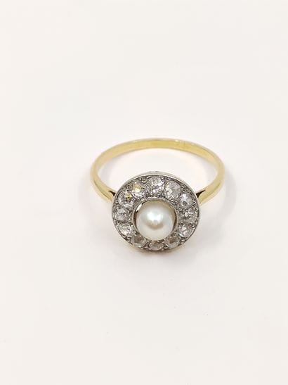 BAGUE circulaire en or 750°, ornée de douze...