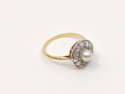 BAGUE circulaire en or 750°, ornée de douze...