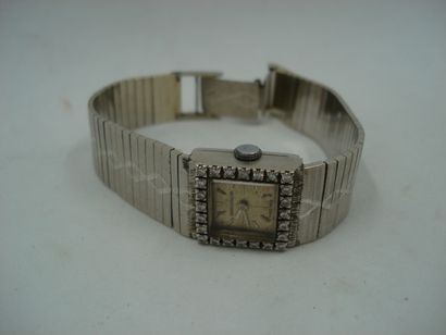 1 Bracelet- montre de dame Or gris 18 carats...