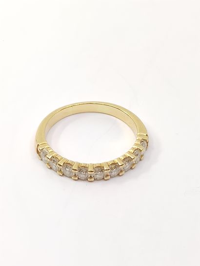 HALF-ALLIANCE in yellow gold 750° decorated...