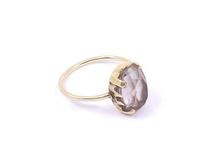 14kt yellow gold ring with a quartz 

Gross...