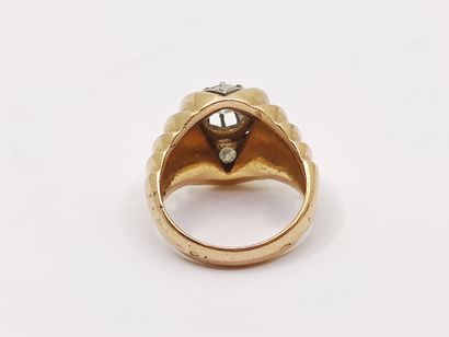 Gold and platinum ring set with a half-cut...