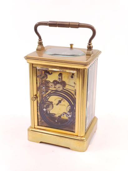 Officer's clock with brass cage

Cream enameled...