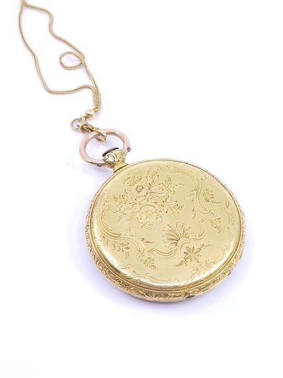 Pocket watch with its chain in gold 750

Double...