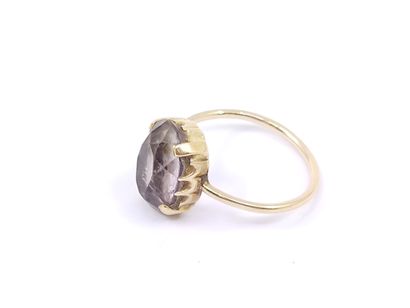14kt yellow gold ring with a quartz 

Gross...