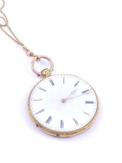 Pocket watch with its chain in gold 750

Double...