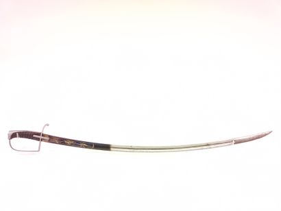 
German style cavalry officer's saber. 




Leather-covered...