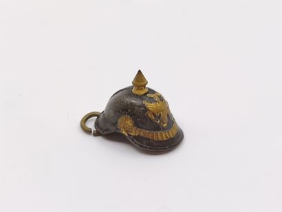 PENDANT representing a small helmet in m...