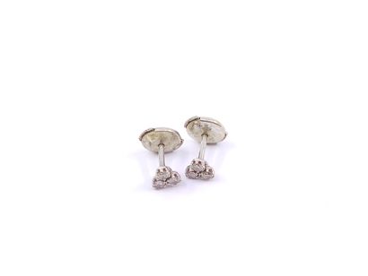 THREE pairs of earrings including:

a pair...