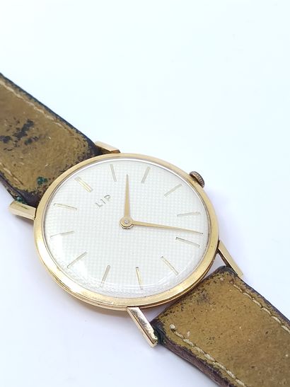 LIP 

Wristwatch, round case in yellow gold...