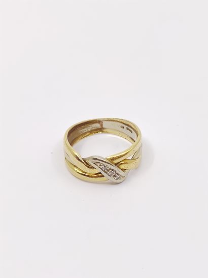 RING in two-tone 750° gold set with a line...