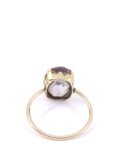 14kt yellow gold ring with a quartz 

Gross...