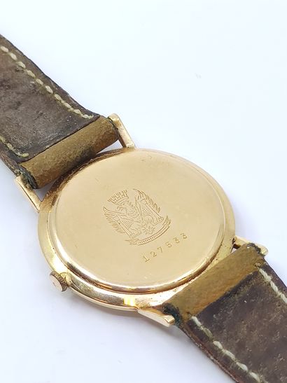 LIP 

Wristwatch, round case in yellow gold...