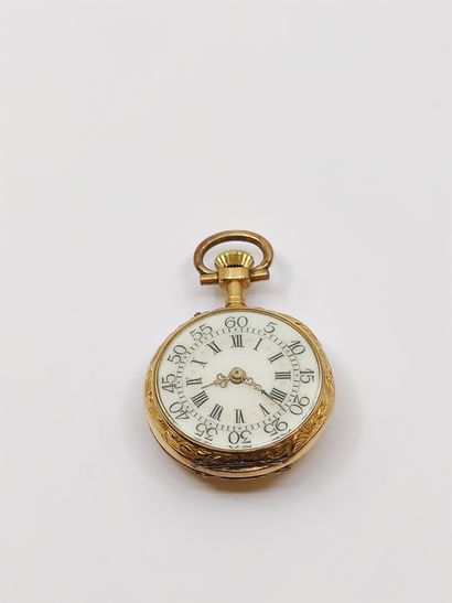 MONTRE de col en or jaune 750° 

Le dos pavé...