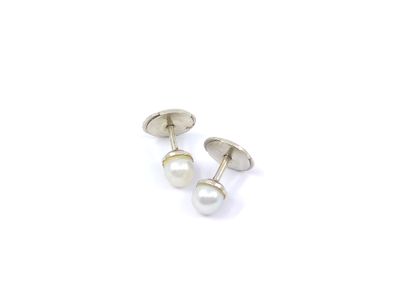 THREE pairs of earrings including:

a pair...
