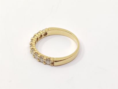 HALF-ALLIANCE in yellow gold 750° decorated...