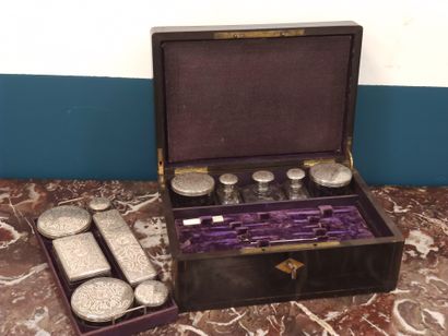 TRAVEL NECESSARY in a blackened wood box...