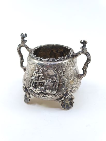 English silver tea service decorated with...