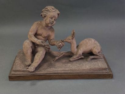 V TENDERINI?

terracotta sculpture on a wooden...