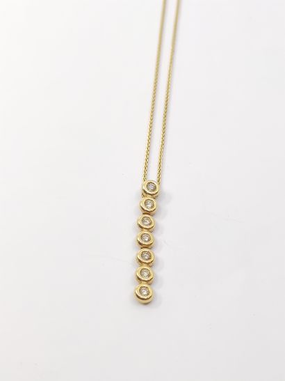 SET comprising : 

Chain in yellow gold 750°...
