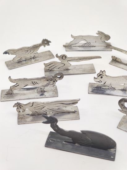 SET of twelve silver plated animal knife...