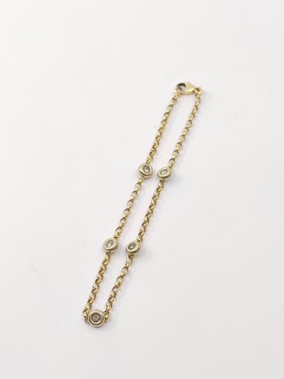 SET comprising : 

Chain in yellow gold 750°...