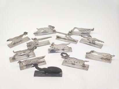 SET of twelve silver plated animal knife...