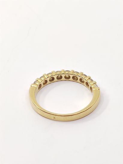 HALF-ALLIANCE in yellow gold 750° decorated...
