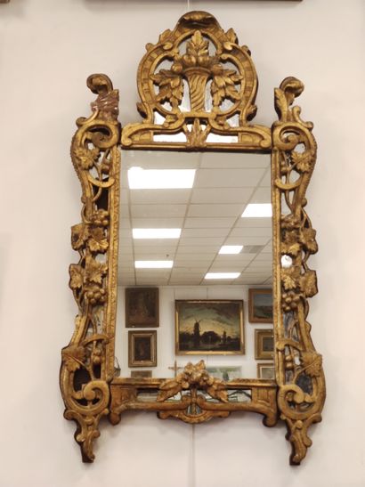 Mirror with carved wood and gilded stucco,...